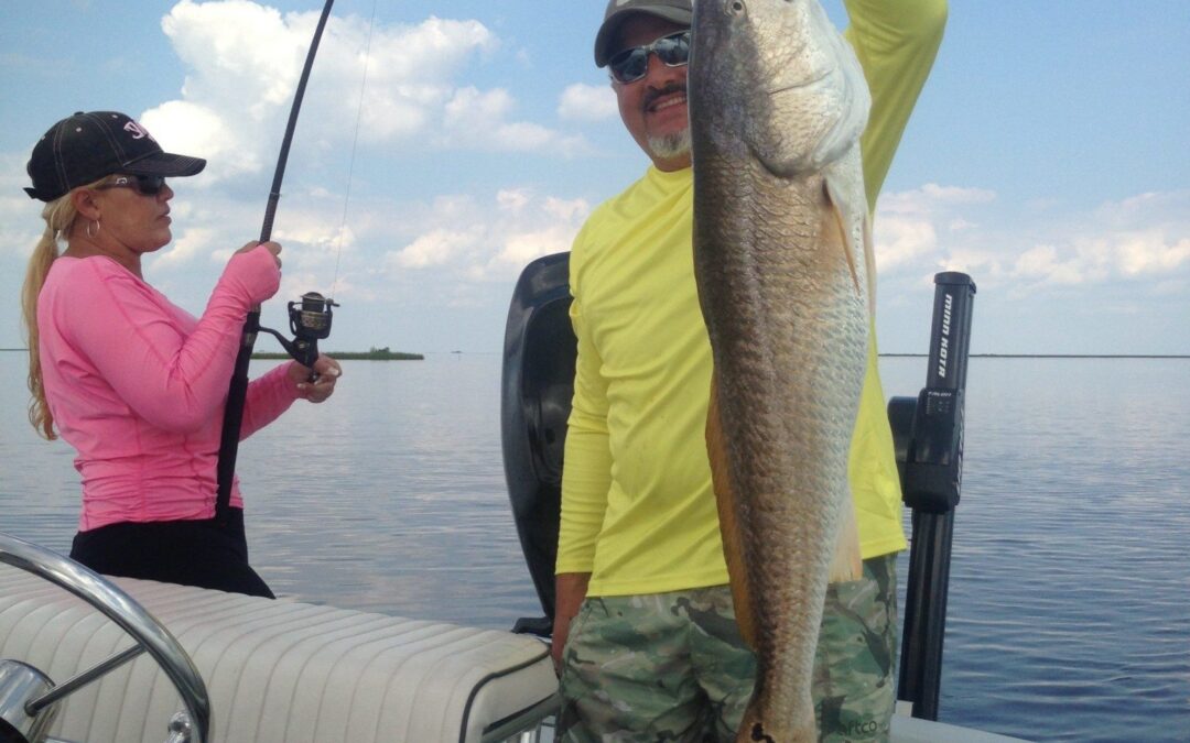 Mrs Mary and Mr Charles  slaying the bull reds / New Orleans Fishing Report 8/31/15